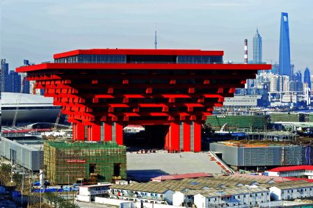 Photo taken on Dec. 6, 2009 shows the China Pavilion in the World Expo Park in Shanghai, east China. The construction of the Shanghai Expo site is making rapid progress and more pavilions take on shape.(Xinhua/Guo Changyao)
