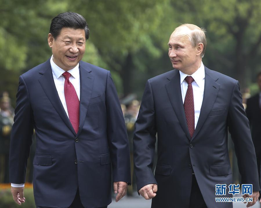 這是會談前，習近平在上海西郊會議中心廣場為普京舉行歡迎儀式�！⌒氯A社記者 蘭紅光 攝